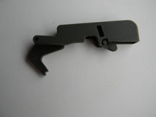 TFPJ36557 TRIGGER LOCK / CATCH : Jonsered 2063, 2065, 2071, 2163, 2165, 2166, 2171, 2172, 2186, 2188 : Husqvarna 336, 339, 362, 365, 371, 372, 375, 385, 390, 394, 395 OEM = 503-556602, 503-556601