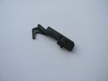 TLHU0269 TRIGGER LOCK / CATCH: Jonsered 2063, 2065, 2071, 2163, 2165, 2166, 2171, 2172, 2186, 2188: Husqvarna 336, 339, 362, 365, 371, 372, 375, 385, 390, 394, 395  OEM = 503-556602, 503-556601